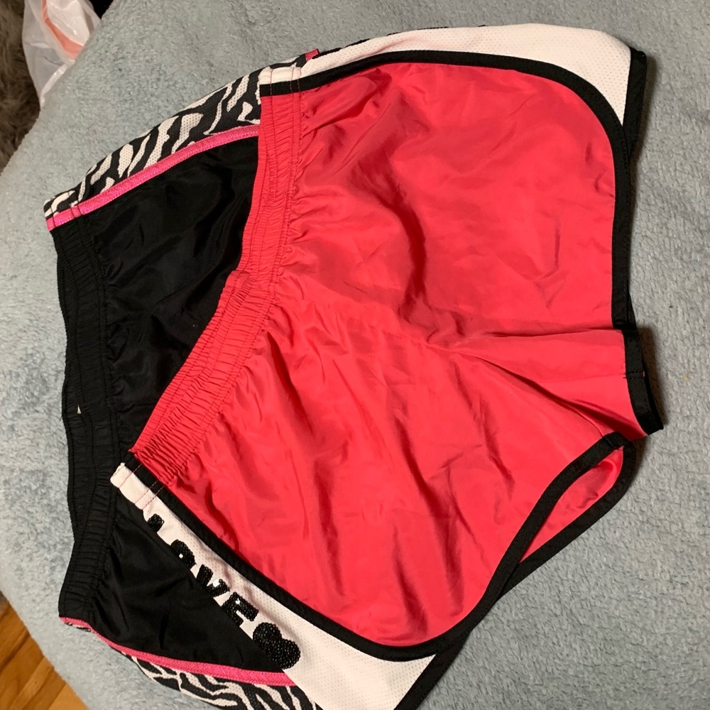 Pink and black workout shorts